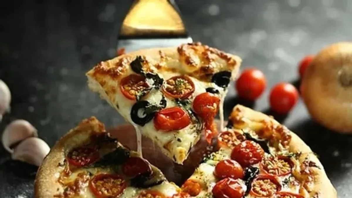 Жұбайы мен ұлын пеште қыздырылған пиццамен уламақ болды