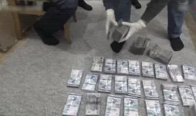 Более 100 млн тенге взяток задокументировано при расследовании коррупционной схемы на границе