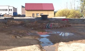 Вода в подвале и опасный котлован образовались у ЖК в Караганде