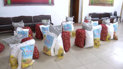 Члены «AMANAT» помогают малообеспеченным семьям