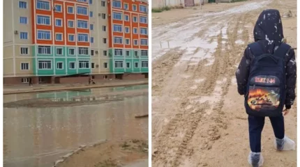 Су тобыққа дейін жетеді: Ақтауда жаңбырдан кейін үйлерді су басқан