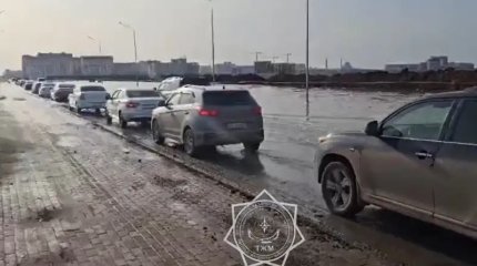 Астанада көшені су басты